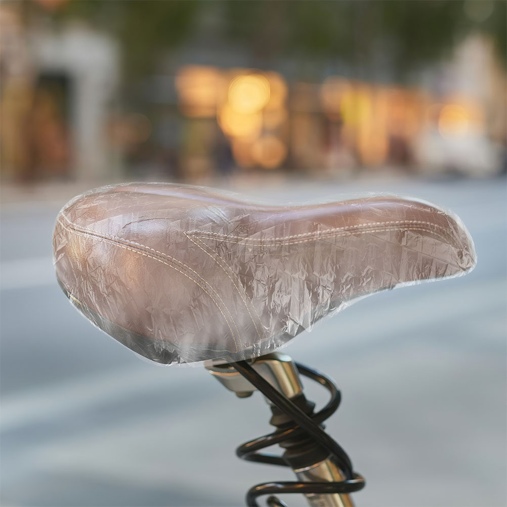 100Pcs Waterproof Saddle Cover - огляд і ціна Cycling Commute In Rain